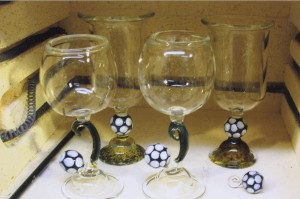 Freehand assorted soccer ball goblet sets and stirrers by Annie.